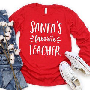 Santa&#39;s Favorite Teacher Shirt, Teacher Shirt, Christmas Shirt, Santa Shirt, Teacher Gift,Teacher Appreciation Gift,Unisex Long sleeve Shirt