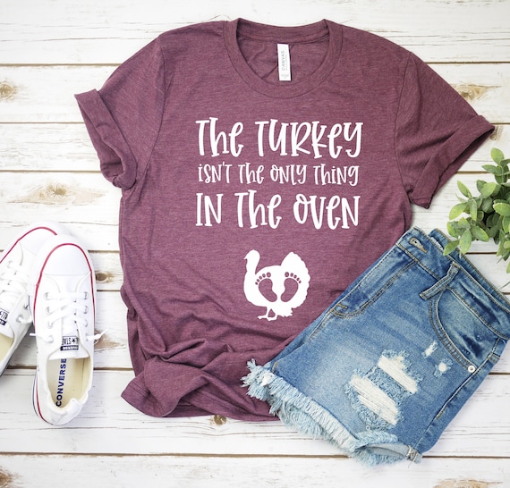 Womens The Turkey Aint The Only Thing In The Oven Baby Announcement T-Shirt Womens The Turkey Aint The Only Thing In The Oven Baby Announcement T-Shirt