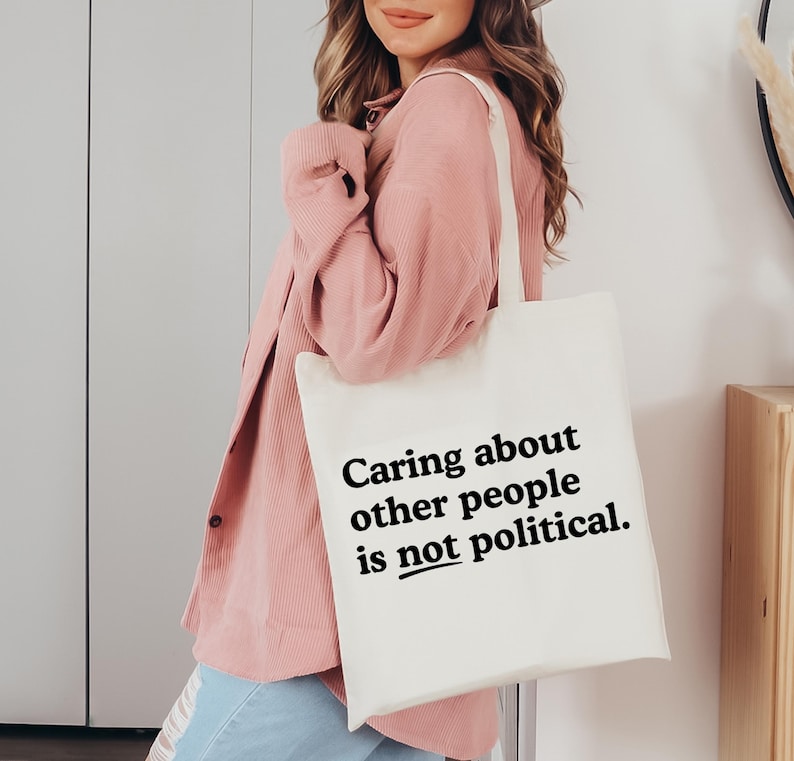 Caring about people is not political, Protest Shirt, Social Worker Shirt, Human Rights Shirt, Teacher Gift, Political Activism Shirts TOTE BAG (NATURAL)