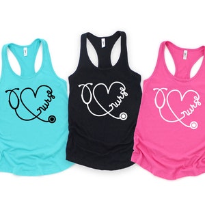 May include: Three tank tops with a stethoscope and heart design and the word "nurse" written inside the heart. The tank tops are turquoise, black, and pink.