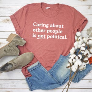 Caring about people is not political, Protest Shirt, Social Worker Shirt, Human Rights Shirt, Teacher Gift, Political Activism Shirts Heather Clay/white