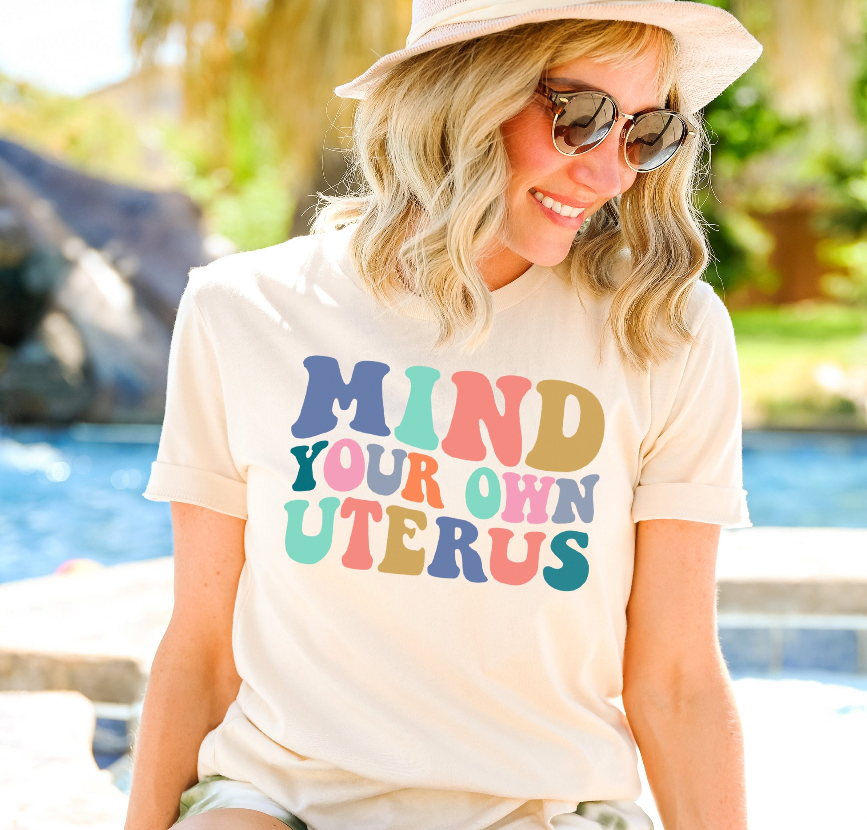 Mind your Own Uterus - Pro Women' Unisex Jersey T-Shirt