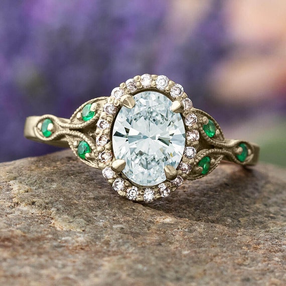 Diamond ring with emerald best sale accents