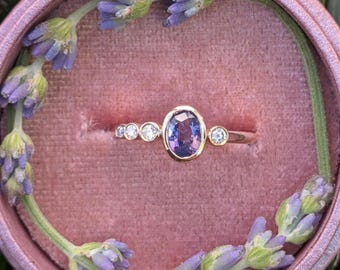 Asymmetrical Unheated Purple Sapphire Ring: Natural Diamonds, 14K Rose Gold Bezel Setting, size 7.25