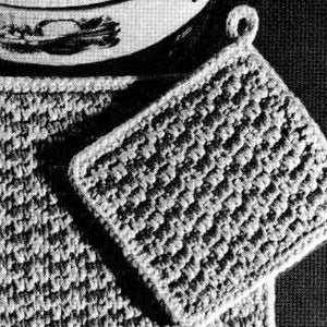 May include: Two crocheted pot holders, one with a loop handle. Both are made with a textured stitch in a light gray color.