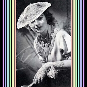 May include: A black and white photo of a woman wearing a white crocheted hat and gloves. She is wearing a patterned dress and a necklace.
