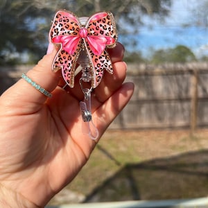 Leopard Print Bow Badge Reel: Gold Glitter Coquette Style