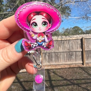 Toy girl inspired glitter retractable badge reel. Great gift idea. Teacher-student ID-nurse/RN-medical worker-retail clerk.Medical worker