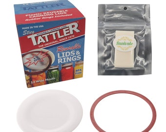 May include: A set of 12 wide mouth reusable canning lids and rings. The lids are white plastic with a red rubber seal. The rings are red. The packaging is blue and white with the words "Tattler" and "Reusable Lids & Rings".