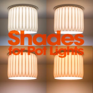 May include: Four cylindrical, vertically ribbed light shades for pot lights are displayed in a grid, each emitting a different colour temperature of light, ranging from cool white to warm amber, with the text Shades for Pot Lights overlaid.