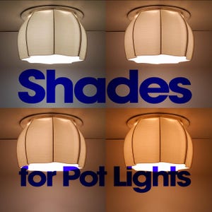 May include: A set of four fabric light shades for recessed pot lights, each featuring a scalloped, bell-shaped design in varying warm and cool white tones. The text "Shades for Pot Lights" is overlaid in bold blue letters across the centre.