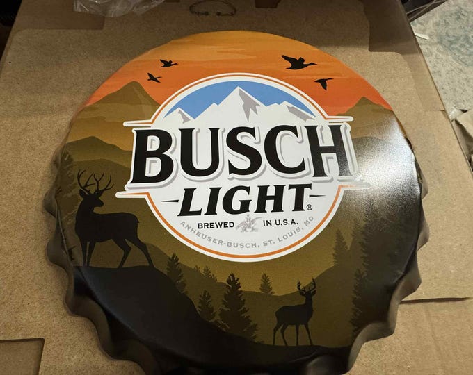 Busch Light 18" Bottle Cap Tin Sign – Vintage Hunting Scene Wall Decor – Deer & Mountain Bar Sign