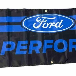 May include: A black banner with blue stripes and the Ford logo in a blue oval. The text "FORD PERFORMANCE" is in red letters.