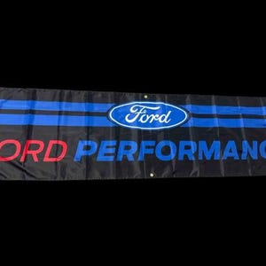 May include: A black banner with blue stripes and the Ford logo in blue and white. The text "FORD PERFORMANCE" is in red letters.