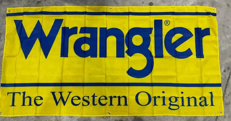 May include: A yellow banner with the text "Wrangler" in blue letters and the text "The Western Original" in black letters.
