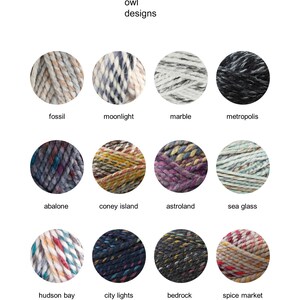 May include: A collection of 12 yarn skeins in various colors and patterns, including fossil, moonlight, marble, metropolis, abalone, coney island, astroland, sea glass, hudson bay, city lights, bedrock, and spice market.
