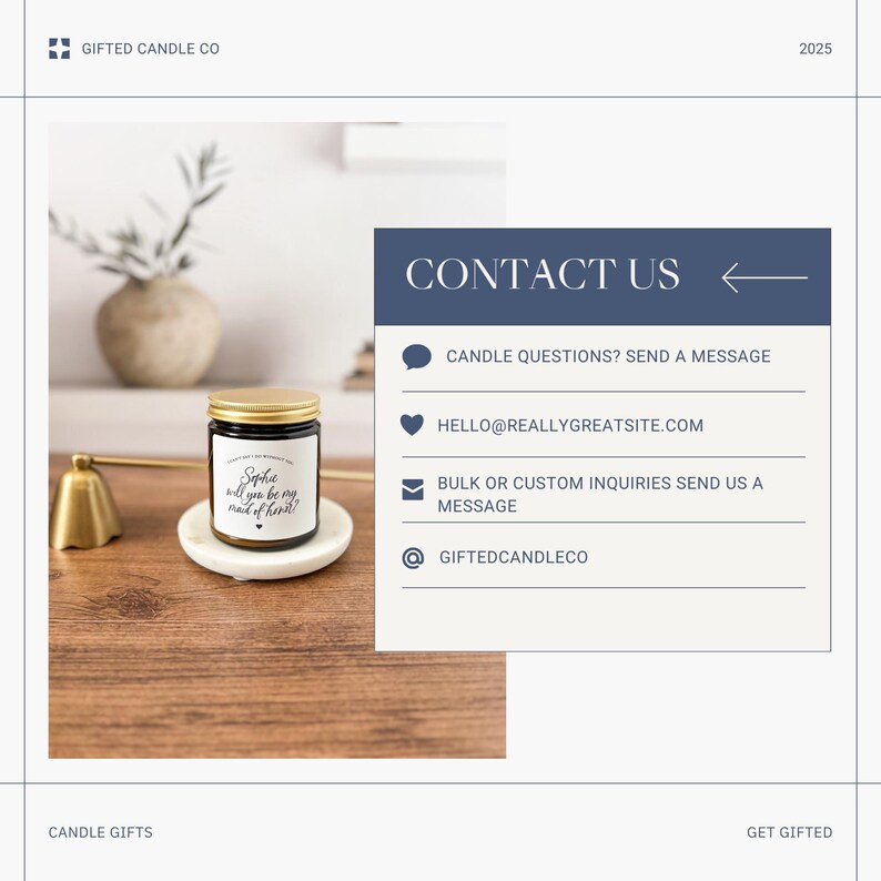 May include: A candle in a black jar with a gold lid sits on a white marble coaster. The candle has a label that reads "Sophie, will you be my maid of honour?" The image also includes a gold bell and a vase with greenery.