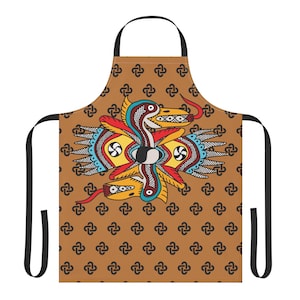 May include: Brown apron with a repeating pattern and a central design featuring a stylized, colorful serpent-like creature. The creature has red, yellow, blue, and white details, with black straps.