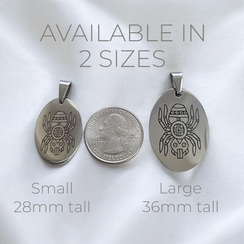 May include: Two silver oval pendants with a spider design. The pendant on the left is 28mm tall and the pendant on the right is 36mm tall.  Available in 2 sizes.