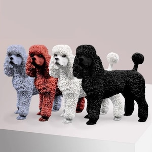 May include: Four poodle figurines in different colours: grey, red, white, and black. The figurines are standing on a white surface.