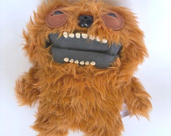 Fuggler Divertido Monstruo Feo Peluche Naranja Peludo Dientes Grandes Sonido de Pedo Juguete ZURU