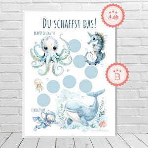 May include: A printable chart with a blue octopus, a blue seahorse, a blue whale, and a blue scuba diver. The chart has the text "DU SCHAFFST DAS!" and "BRAVO! GESCHAFFT!" and "FERTIG? LOS!" in German.