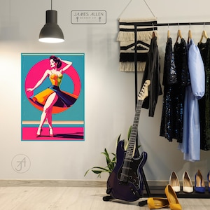 May include: A vibrant art print showcasing a woman in a retro dress, set against a teal backdrop with a pink circle. The print is displayed on a wall, with a guitar and clothing rack in the background. The print is from James Allen Design Co.