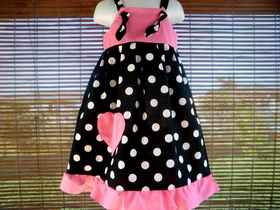 pink dress with black dots