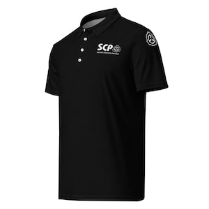 May include: Black polo shirt with white text and logo. The shirt features the text "SCP SECURE CONTAIN PROTECT" and a symbol on the chest and shoulder. The shirt has a collared neckline and three buttons.