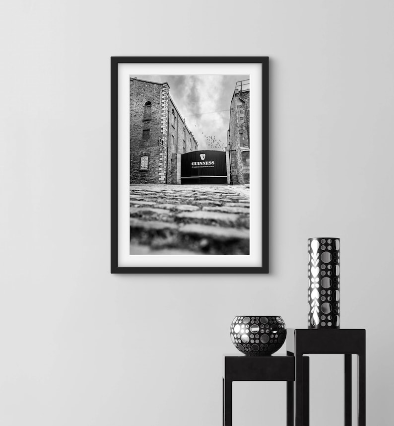Black and white Guinness Gate Dublin photo print of St. James’s Gate Brewery – monochrome Ireland wall art for pub decor and travel lovers.
