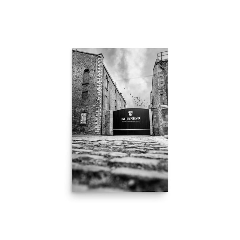 Black and white Guinness Gate Dublin photo print of St. James’s Gate Brewery – monochrome Ireland wall art for pub decor and travel lovers.