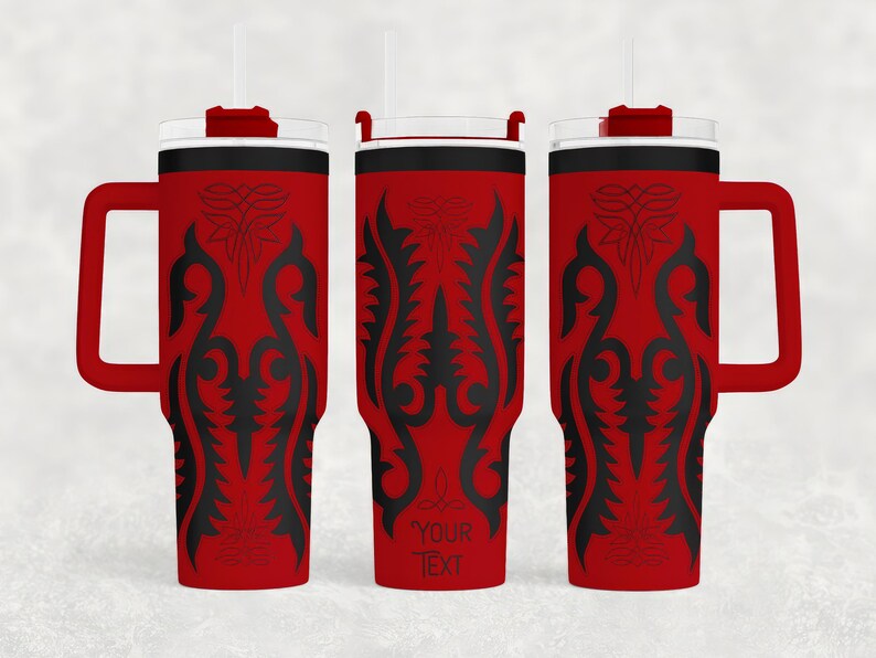 May include: Red insulated tumbler with a black decorative design and a handle. The tumbler has a white straw and a black rim. The text "YOUR TEXT" is printed on the tumbler. This tumbler is perfect for hot or cold beverages.
