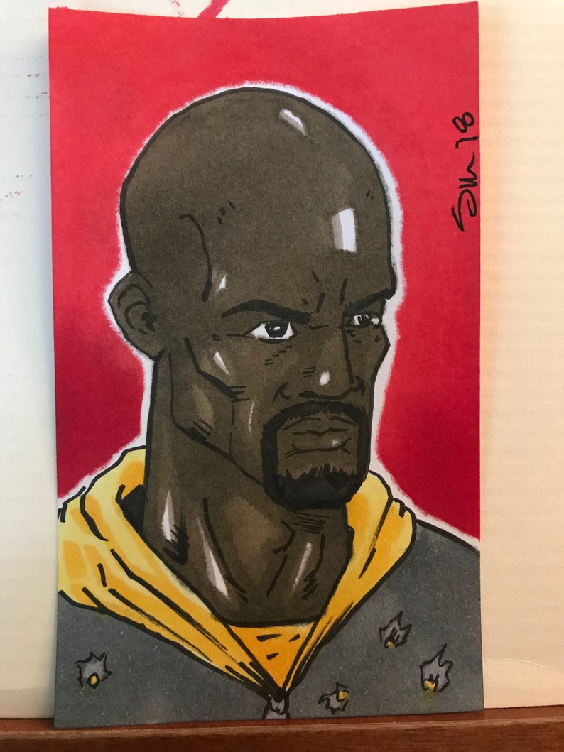 luke cage bullet hole hoodie