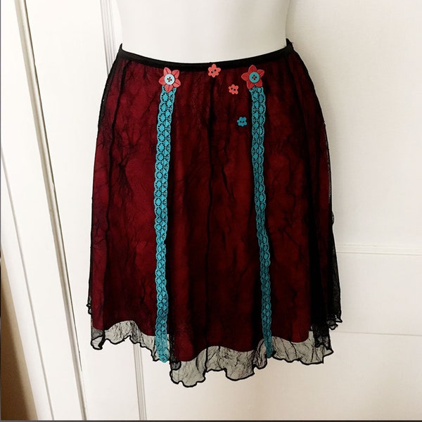 black fishnet mesh on red stretch slip skirt with cerulean blue lace & floral embellishments flower buttons womens size SMALL 90s upcycled