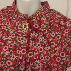 floral short sleeve top pink orange green flowers stretch cotton fabric brass grommet neck tie detail upcycled nonbinary women&#39;s size L - XL