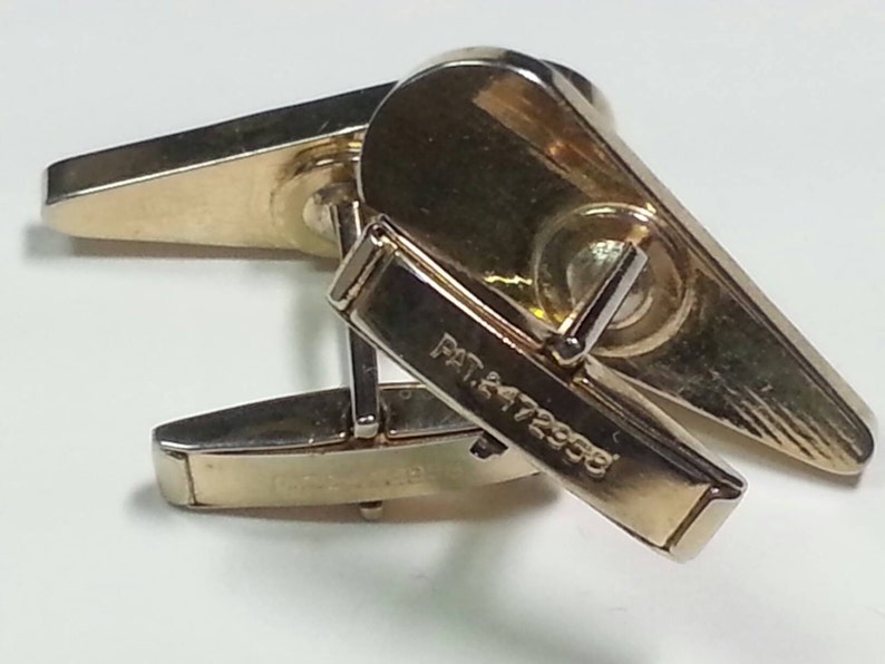 1949-1950 Vtg futuristic tie clip and cufflinks set in gold tone metal pat