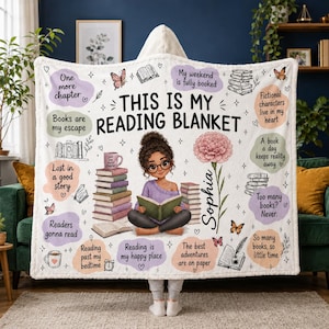 May include: A white hooded blanket featuring the text THIS IS MY READING BLANKET, a cartoon illustration of a person reading, stacks of books, a flower, butterflies, and various reading-themed quotes including My weekend is fully booked.