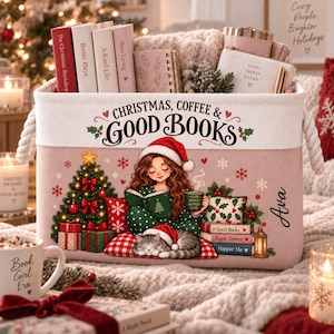 May include: A rectangular fabric storage bin with rope handles, featuring the text "CHRISTMAS, COFFEE & GOOD BOOKS" and an illustration of a person reading with a cat. The bin is filled with books, a notebook, and a pouch labeled "GOOD THINGS AHEAD".