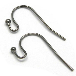 May include: Two silver-toned earring hooks with a small ball at the top of each hook.