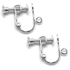 May include: Two silver-toned earring clips with a screw-on back. The clips are designed to hold earrings in place without piercing the ear.