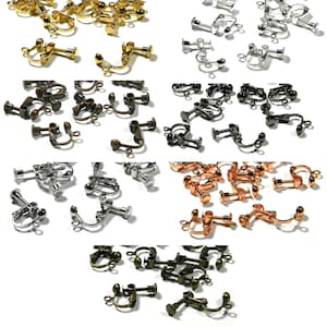 May include: Assortment of earring clips in various finishes, including gold, silver, black, bronze, and copper. The clips are designed to secure earrings to the ear without piercing.