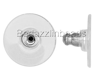 May include: A pair of clear plastic earring backs with a silver metal post. The earring backs are designed to be used with stud earrings.