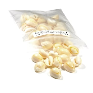 May include: A clear plastic bag filled with white cowrie shells. The bag is labeled "BeadzNThings" with the text "welcom to our store!"