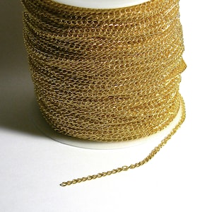 Shiny Gold Thin Twisted Curb Link Chain Plated Over Iron Metal Sold in Bulk by the Yard Unfinished