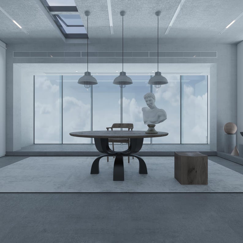 May include: A modern dining room with a large wooden table and four black metal chairs. The table has a unique design with a curved base. There are three pendant lights hanging from the ceiling, and a white bust of a man on a pedestal in the background.