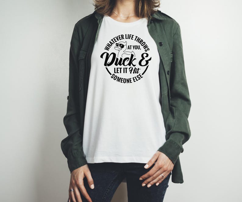 May include: White t-shirt with a black graphic of a duck wearing sunglasses and the text "Whatever life throws at you, Duck & Let it Hit Someone Else."