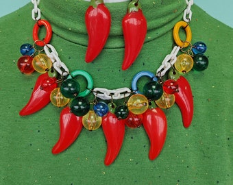 Red Hot Chillis! Colourful 1940s 50s carved bakelite fakelite style novelty Chilli necklace and earrings by Luxulite