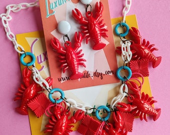 Lucky Lobsters! - Red and blue Beachcomber 50s vintage style lobster necklace handmade by Luxulite