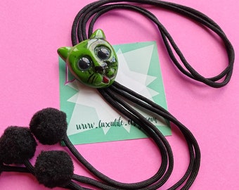 Marbled green cat Kitschy cord bolo tie - 1940s 50s Bakelite Fakelite style novelty bolo slide with pom poms by Luxulite