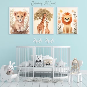 May include: Three watercolour illustrations of animals in a nursery setting. The first illustration shows a lion cub sitting on a branch. The second illustration shows a giraffe and a baby giraffe standing under a tree. The third illustration shows a lion sitting in a field of flowers. The text "Coloring Art Land" is at the top of the image.
